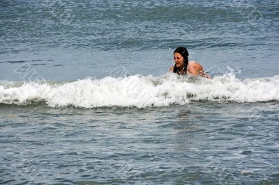 Girl in the waves