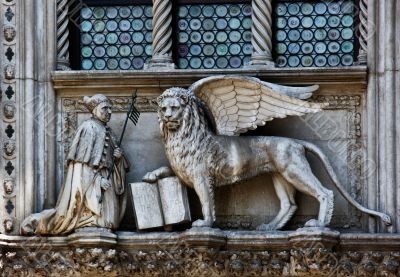 The Venetian lion and Doge on a cathedral building on San Marco 