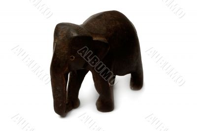 Souvenir figure of a wooden elephant. Isolated on white backgrou