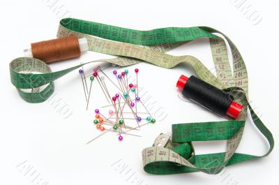 thread, needles and tape for sewing set