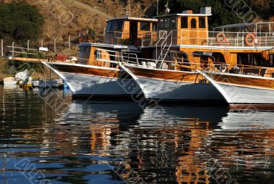 Three Boats In Harbor
