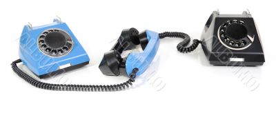 Two telephone with the taken off handset