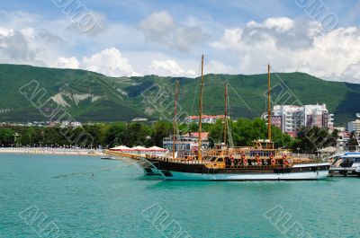 town waterfront with moored vessels