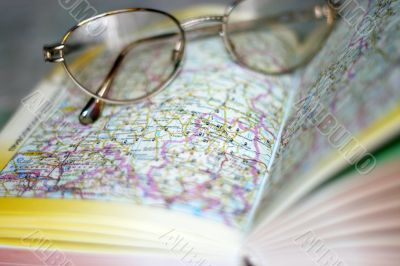 spectacles on page geographical atlas