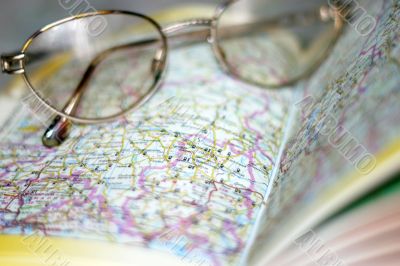 spectacles on page geographical atlas