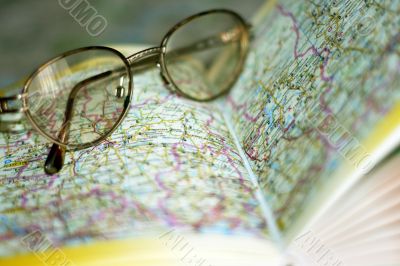 spectacles on page geographical atlas