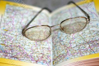 spectacles on page geographical atlas