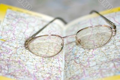 spectacles on page geographical atlas