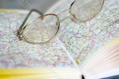 spectacles on page geographical atlas