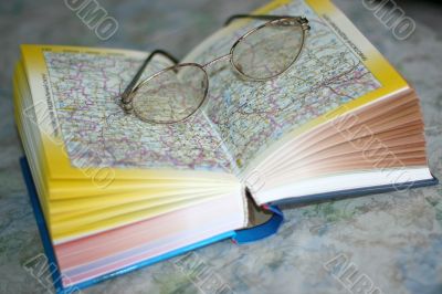 spectacles on page geographical atlas