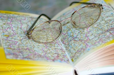 spectacles on page geographical atlas