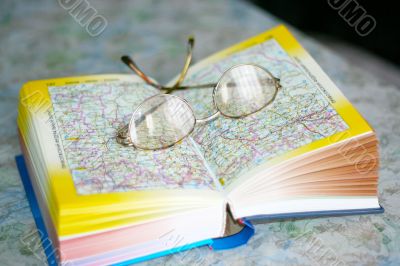 spectacles on page geographical atlas