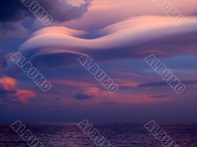 Unusual cloud over sea.