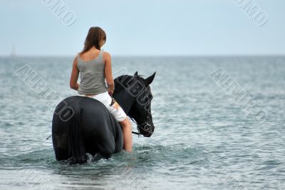 horseback riding in the sea