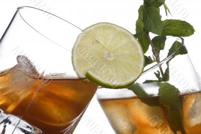 glass of whiskey with ice cubes glass of whiskey with ice cubes
