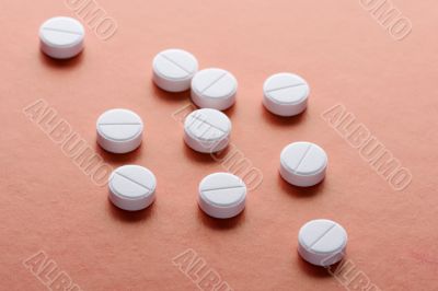 Medical tablet on red Medical tablet on red