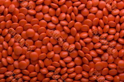 Red Tablet on red macro Red Tablet on red macro