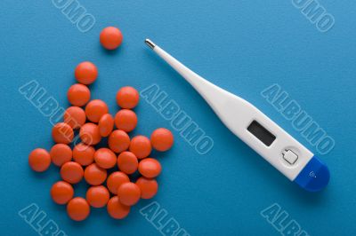 Tablets and thermometer macro Tablets and thermometer macro