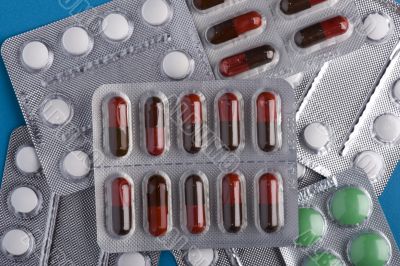 Tablets close up on blue Tablets close up on blue
