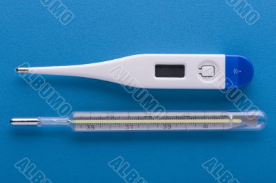 thermometer on blue macro thermometer on blue macro