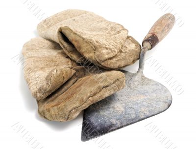 A trowel and mittens