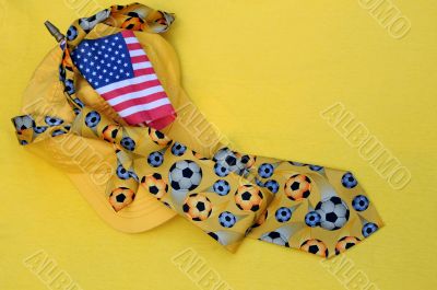 Yellow Baseball Cap, Necktie and US Flag