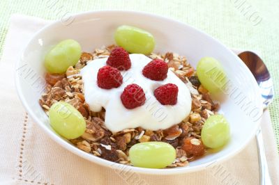 Healthy breakfast with muesli, yoghurt and berries