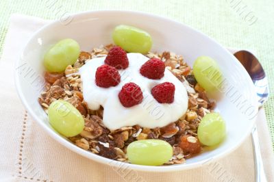 Healthy breakfast with muesli, yoghurt and berries Healthy breakfast with muesli, yoghurt and berries