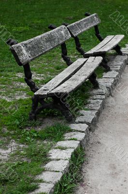 Two wooden park brenches