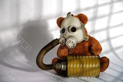 Soft toy bear with gas mask