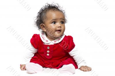 Baby girl learning to sit