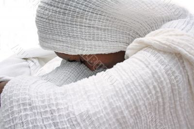 Young Ethiopian woman praying
