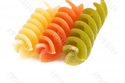 Colorful raw fusilli macaroni