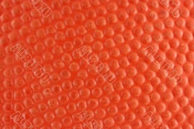 Orange rubber basketball macro background