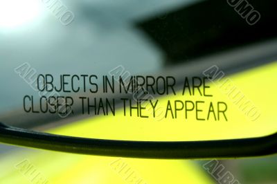Objects in mirror are closer then they appear Objects in mirror are closer then they appear