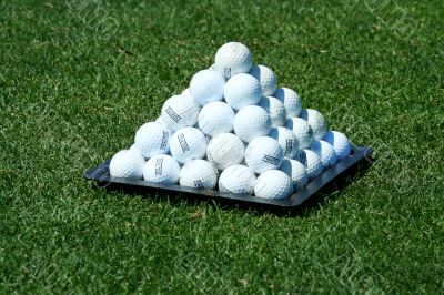 Pyramid of practice golf balls