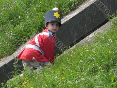 little boy disguised in british soldier