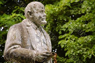 Deserted, shabby and flaky monument to Lenin