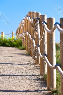 Pathway with wood post fence