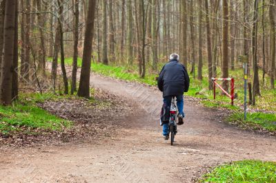 Old man riding a bicycle - II