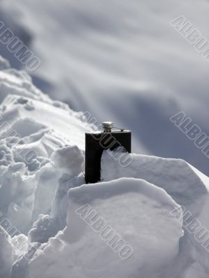 Hipflask in snow Hipflask in snow