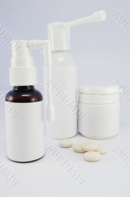Bottle of Medicine with pills and  spray for nose