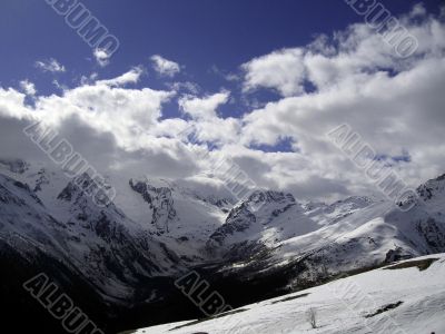 White clouds over mountains