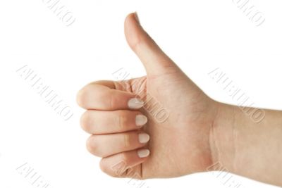 Woman gesturing up with her thumb