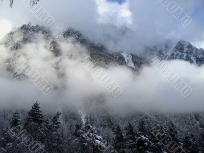 Clouds between the mountains