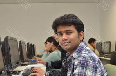 Adult professional in computer class