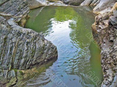 Green rive and the bluesky reflection