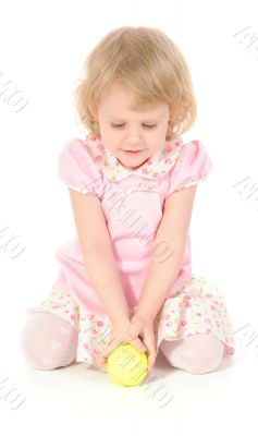 Little girl and tennis ball.