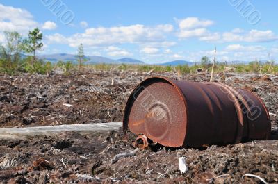 Old rusty metallic barrel