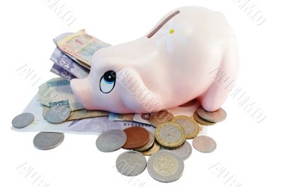 Piggy bank money box with different currency money Piggy bank money box with different currency money